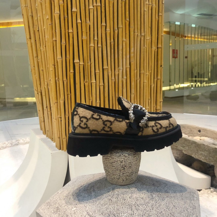 G*u*i loafers