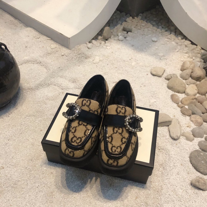 G*u*i loafers