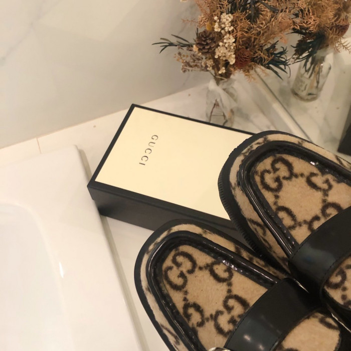 G*u*i loafers