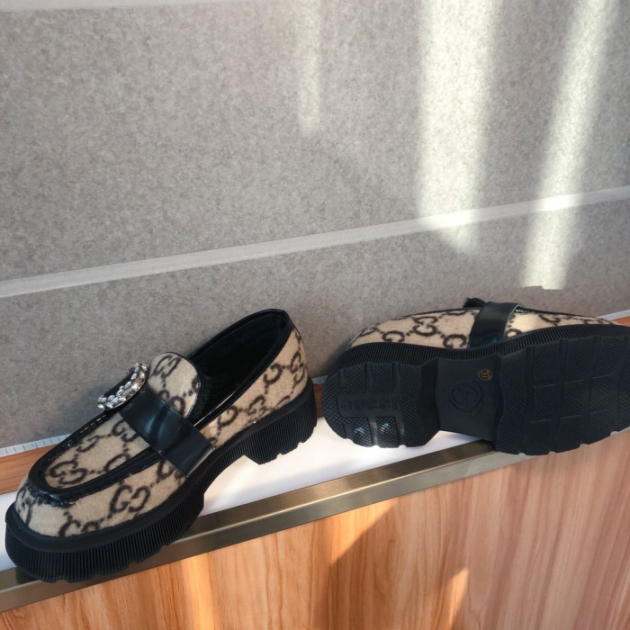 G*u*i loafers