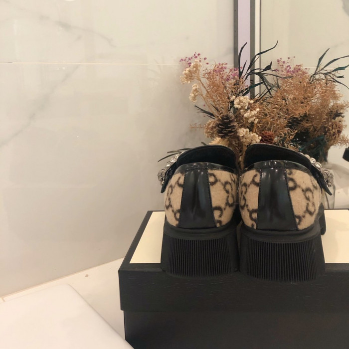 G*u*i loafers