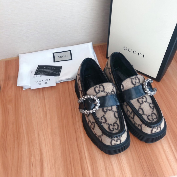 G*u*i loafers