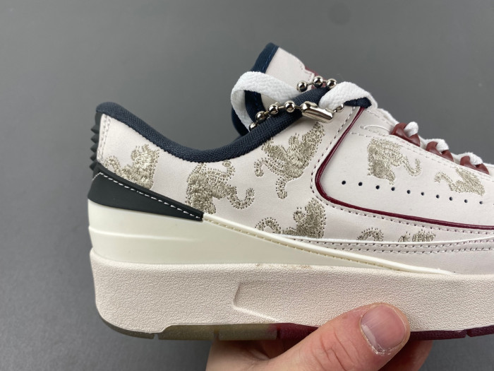JORDAN 2 RETRO LOW YEAR OF THE DRAGON (WOMEN