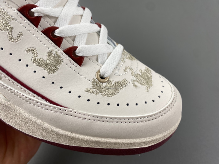 JORDAN 2 RETRO LOW YEAR OF THE DRAGON (WOMEN